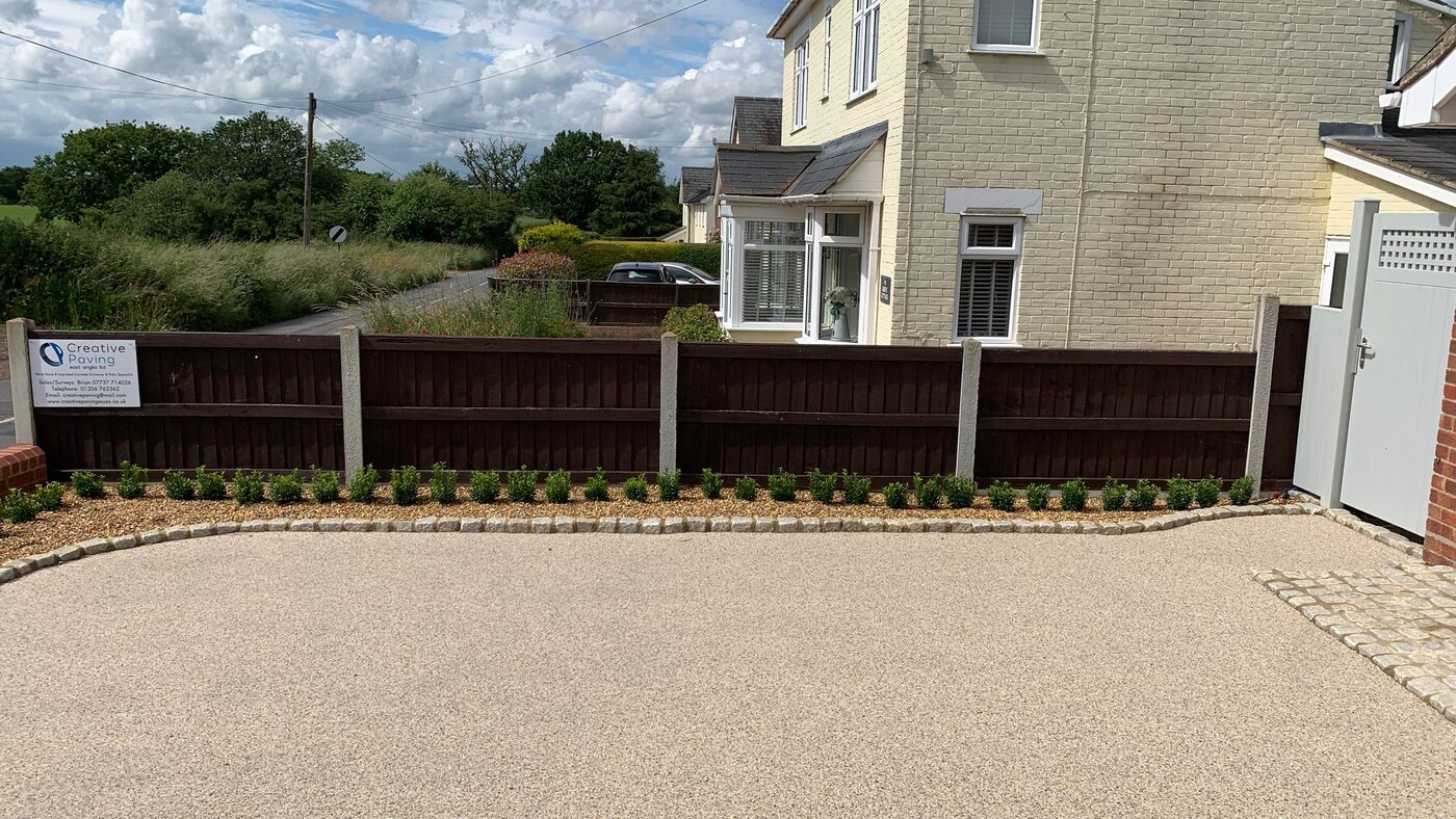 Block paving driveway with garage